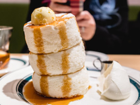 Vendor timing the perfect imagawayaki flip.