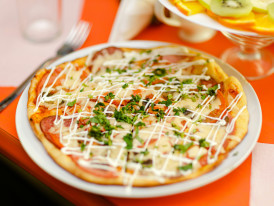 Fusion pizza with Japanese toppings. Image by Игорь Антипов from Unsplash