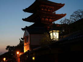 Namba Yasaka Shrine lit at dusk Photo by Shpëtim Ujkani on Unsplash