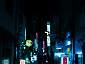 Neon-lit side street off Dotonbori Photo by Him Chong on Unsplash