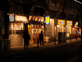 Lawson at midnight with lone shopper Photo by Mak on Unsplash