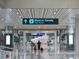 Kansai Airport terminal with clear signage pointing to train platforms Photo by Muhammad Aziz Ali Mutia Unsplash