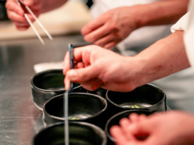 Chef preparing traditional dashi in a modern kitchen Photo by Madeline Liu on Unsplash