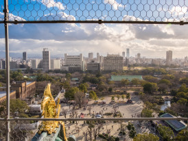 View of modern Osaka from Osaka Castle observation area photo by Puripat Lertpunyaroj on shutterstock