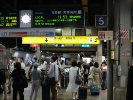 Crowded Osaka train platform during rush hour Photo by MChe Lee on Unsplash