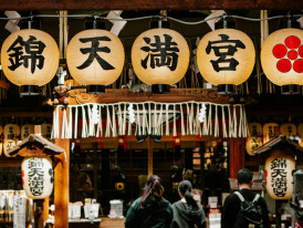 Traditional market stall displaying various local craft items. Photo by Diana Lisunova on Unsplash
