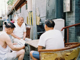 Local Osaka residents engaging in friendly conversation Photo by Kai Wei on Unsplash