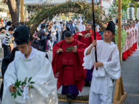 Local festival at Osaka shrine with community participation Photo by Buddy Photo on Unsplash