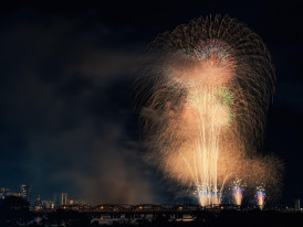 Fireworks over Osaka river during summer festival with boat procession below Image by Kanenori from Pixabay