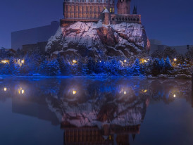 Wizarding World of Harry Potter at dusk with lights beginning to glow. Image by we-o_rd35omj_5fvnk7lro from Pixabay