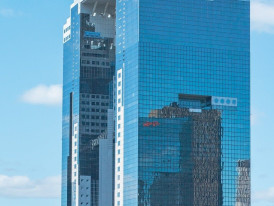 Umeda Sky Building’s distinctive architecture against sunset sky Image by 