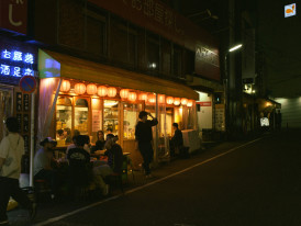 Hip cafe with outdoor seating on tree-lined street Photo by hayato togashi on Unsplash