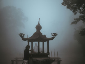 Morning mist in the temple cemetery with stone monuments.  Photo by Annie Spratt on Unsplash
