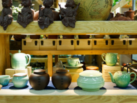 Traditional craft shop interior displaying authentic handmade pottery and textiles Photo by Eric Prouzet on Unsplash