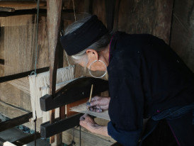 Craftsperson explaining traditional techniques while creating authentic items Photo by Claire on Unsplash