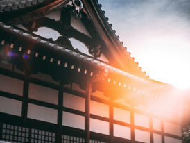 Golden hour sunlight transforming traditional Kyoto temple architecture Photo by Charles Postiaux on Unsplash