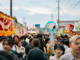 Locals at a small outdoor festival Photo by Aditiya Nugroho on Unsplash