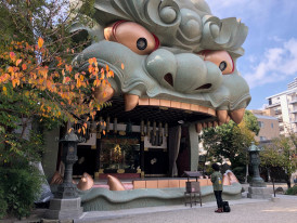 Close-up of Namba Yasaka Shrine's lion head gate 