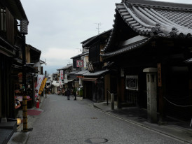 A quiet traditional street with few visitors showing authentic Kyoto architecture and peaceful atmosphere Photo by MChe Lee on Unsplash