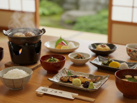 A traditional Japanese meal setup showing proper bowl positioning and serving etiquette