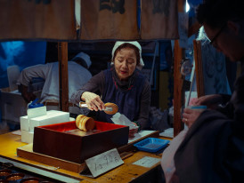 Traditional craft workshop with elderly artisan working on handmade items. Image by Atsadawut Chaiseeha from Unsplash