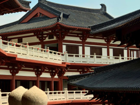 Imperial Palace's formal wooden architecture with wide courtyards and traditional rooflines Photo by Wu Zhongyi on Unsplash