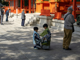 Visitor participating respectfully in local cultural activity alongside residents Photo by Kouji Tsuru on Unsplash