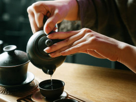 A traditional tea ceremony taking place in a modern tatami room Photo by Ivan Samkov on pexels