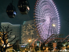 Ferris wheel with city landscape in view. Photo by Tsuyoshi Kozu on Unsplash
