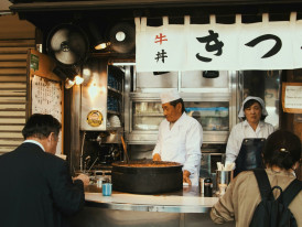 Coffee being served in a shipping container café Photo by Nomadic Julien on Unsplash