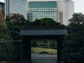 Traditional wooden structure against modern skyline Photo by Tsuyoshi Kozu on Unsplash