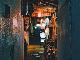 A narrow yokocho (alley) in Namba lined with intimate restaurants and bars Photo by Tuan Nguyen on Unsplash