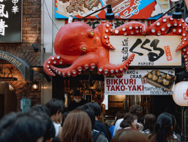 Visitors enjoying the convivial atmosphere of Osaka's foodie culture – the perfect end to a culinary journey Photo by Shriram Nagarajan on Unsplash