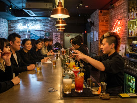 Craft cocktail bar with creative drink presentation.