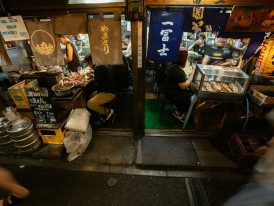 Hidden alley food stall with only a few seats and local customers.Photo by Philip Ho on Unsplash