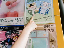 Group of friends pointing at a food menu written in Japanese characters. Photo by 8 verthing on Unsplash