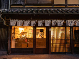 Historic Osaka food district with traditional eateries and vintage architectural details Photo by Viviana Nysaether on Unsplash