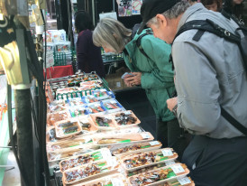 Guests exploring some market items