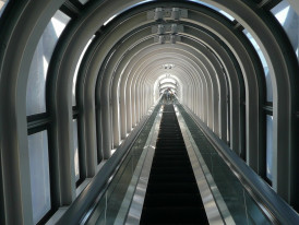 Escalators inside the floating garden photo by Pixabay