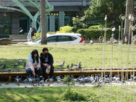 Local workers taking a break in a small park Photo by Arthur Tseng on Unsplash