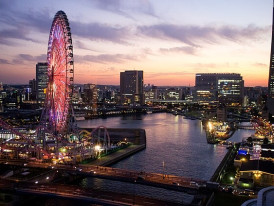  Sunset view over Osaka with the city neon lights beginning to twinkle photo by TimBray on Creative Commons Attribution-Share Alike 4.0