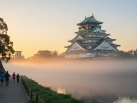  Early morning mist around Osaka Castle with joggers on the path