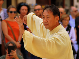 Small neighborhood park with elderly residents practicing tai chi under morning light. Image by Gianni Crestani from Pixabay