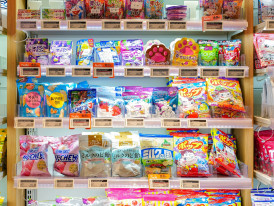 Close-up of Japanese convenience store meal shelf Photo by Declan Sun on Unsplash