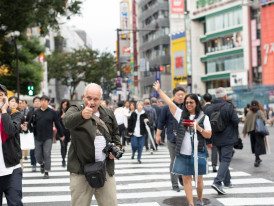 Guest posing for a photo for the host.