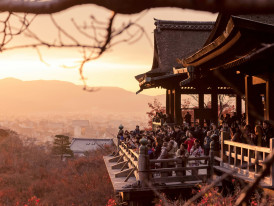 Sunset view over Kyoto showing traditional and modern elements in harmonious coexistence Photo by Match Sùmàyà on Unsplash