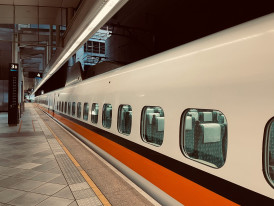 The Shinkansen platform at Kyoto Station with bullet trains preparing for departure to Tokyo Photo by Ting Ting on Unsplash