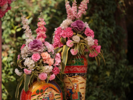 Seasonal flowers arranged in a traditional Japanese vase Photo by Abhishek Sharma on Unsplash