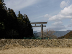 Traditional garden gate opening to reveal distant mountains Photo by Kieran on Unsplash