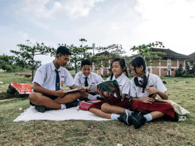 The exterior of the Kyoto International Manga Museum with kids reading outside. Photo by ROMAN ODINTSOV on pexels